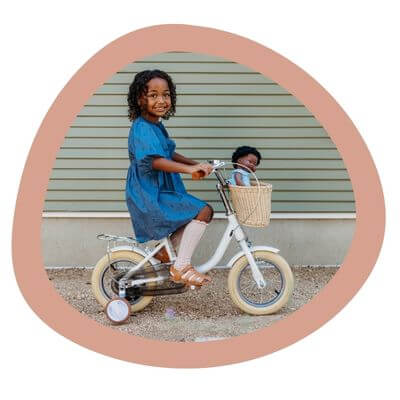 A child on a Banwood Children's bike.