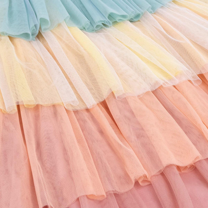 A close up view of the layers of pastel tulle in the Rainbow Ruffle Princess Costume Set from Meri Meri.
