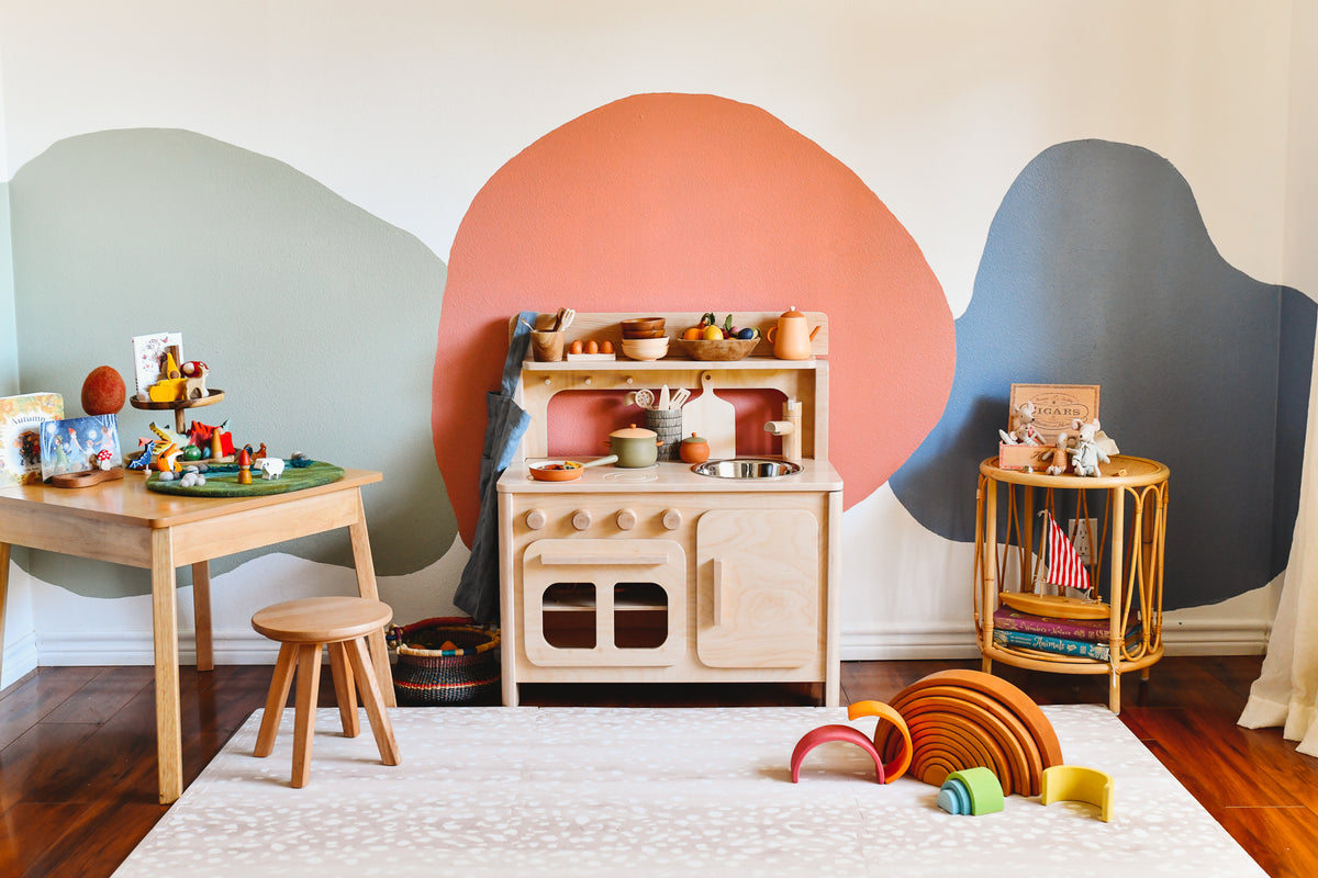 Bella Luna Toys Play Kitchen with wooden toys in play room