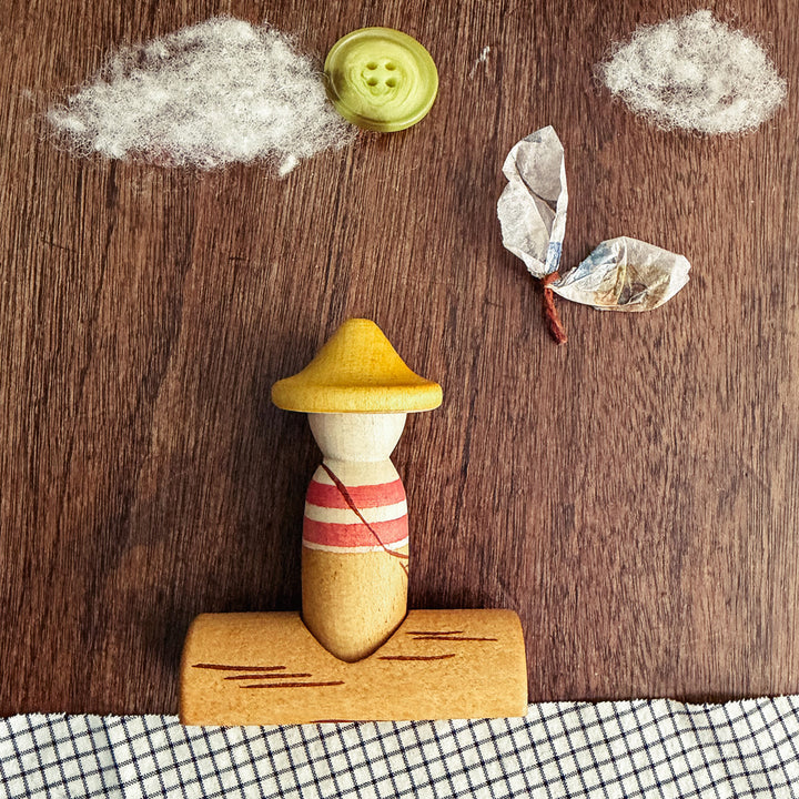 Grapat Lucky Lucky 5th Edition - image of one of the wooden toys in a collage against a wooden background - Bella Luna Toys