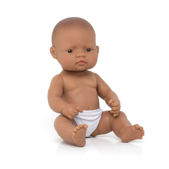 A Miniland 12-inch Realistic Montessori Hispanic Girl Baby Doll. Anatomically correct and designed for inclusive, educational play.