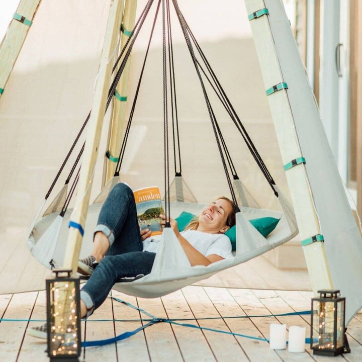 Bijou Build Nest outdoor shelter with suspended 5-foot Hover swing, UV-protective fabric canopy, solar LED lights, and cushions for relaxing outdoors - Bella Luna Toys