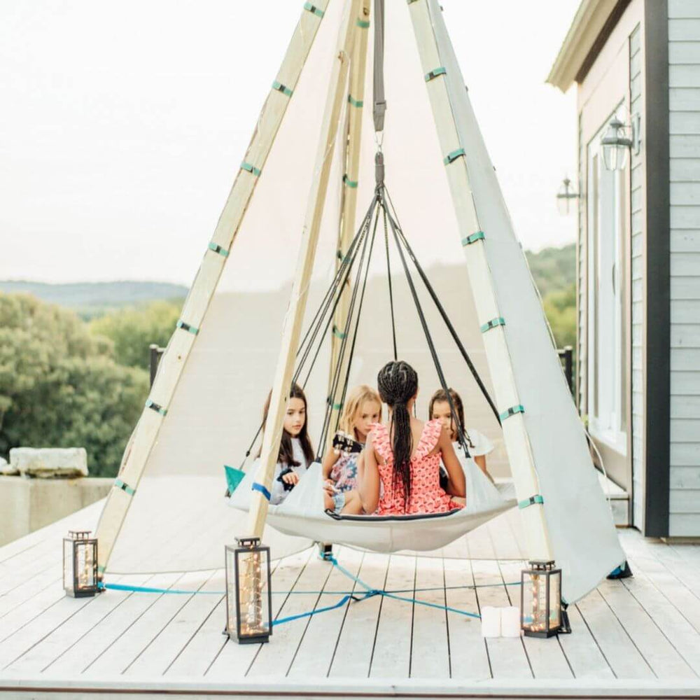 Sky Hover Swing with a spacious 5-foot suspended platform, hanging ropes, and two outdoor cushions for relaxing and outdoor play - Bella Luna Toys