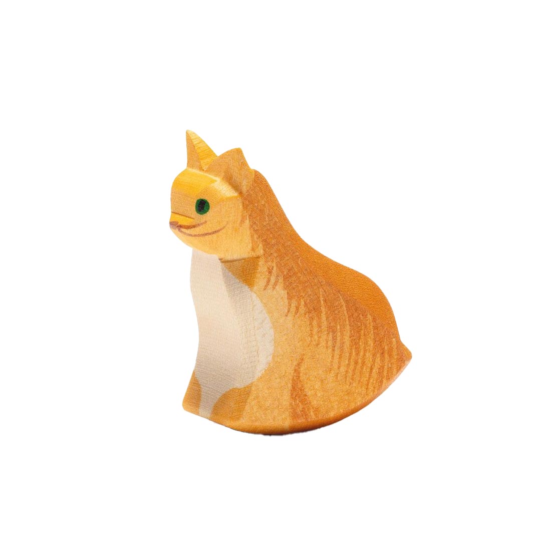 Wooden cat figurine on a white background