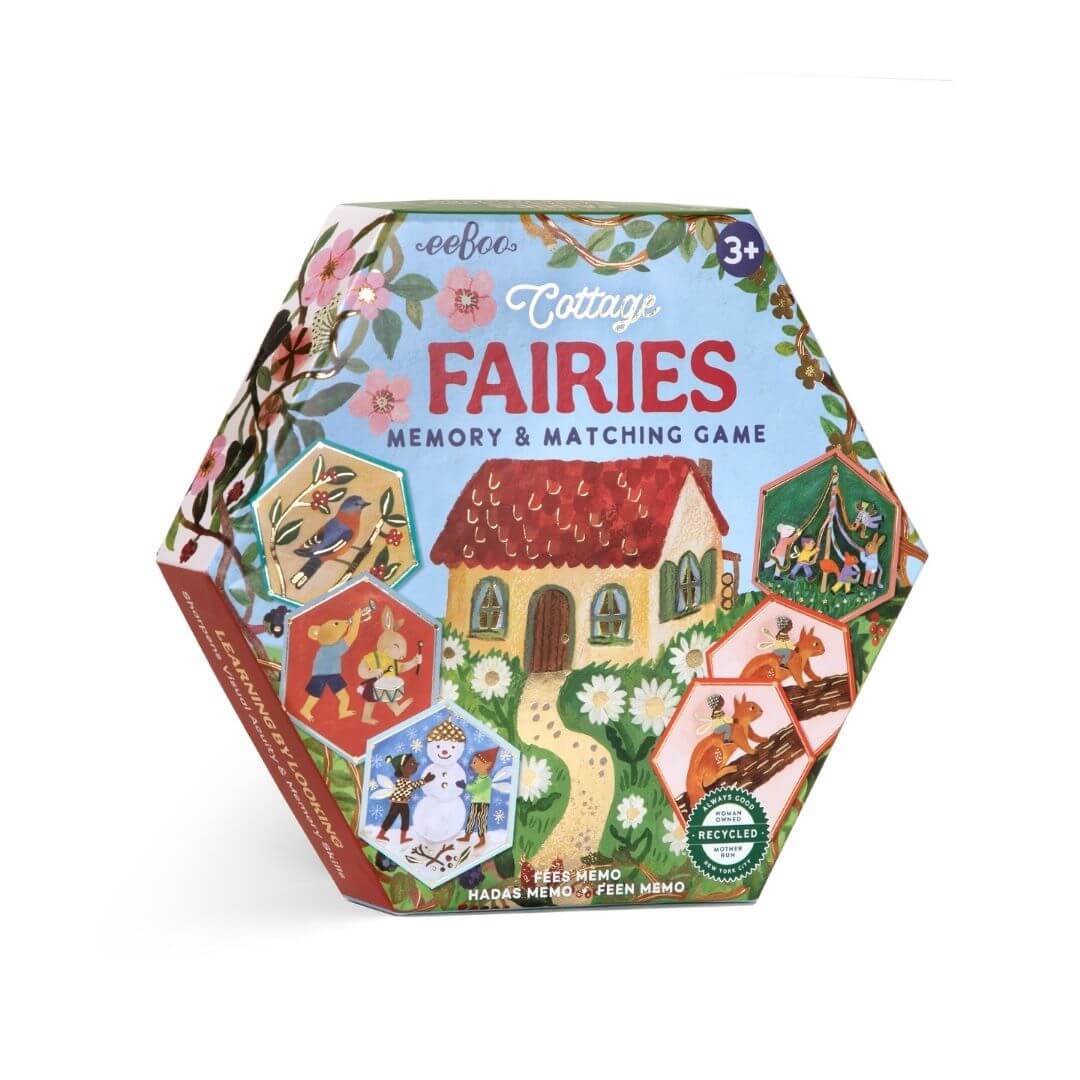 eeBoo Cottage Fairies Matching Game in a hexagonal box featuring whimsical fairy artwork by Gemma Koomen, with gold foil accents on beautifully illustrated matching tiles.