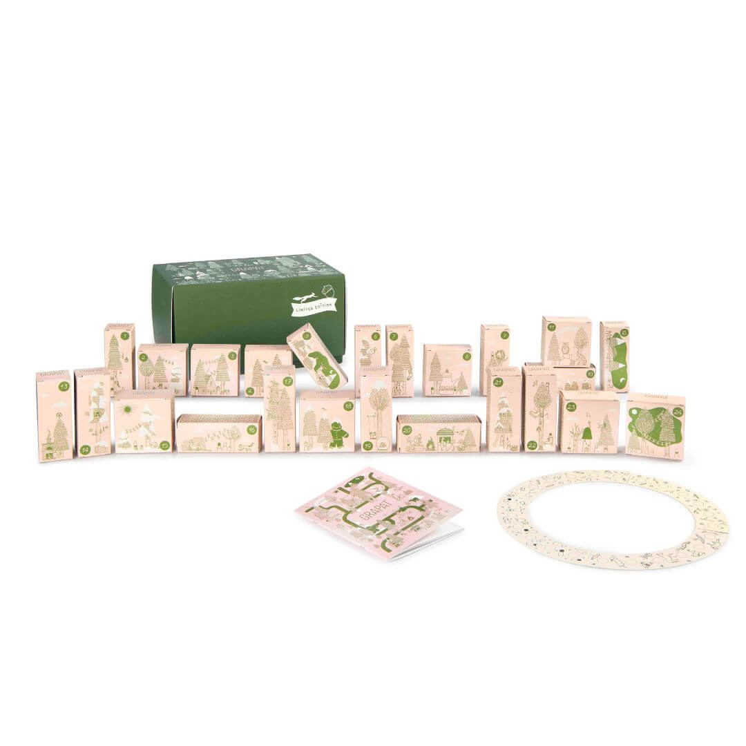 Grapat 2025 Advent Calendar with 24 illustrated reusable boxes, booklet, and celebration circle displayed together – Bella Luna Toys.
