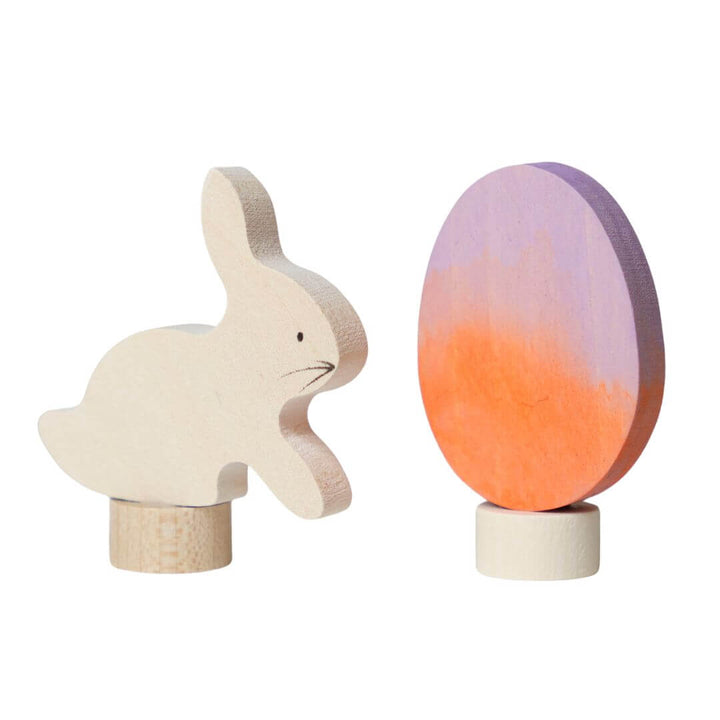 Grimm's Easter Egg and Bunny Celebration Ring Decorations – a handcrafted wooden bunny and an egg with a batik-style gradient in orange and purple. These seasonal decorations are perfect for celebrating spring, nature, and family traditions.