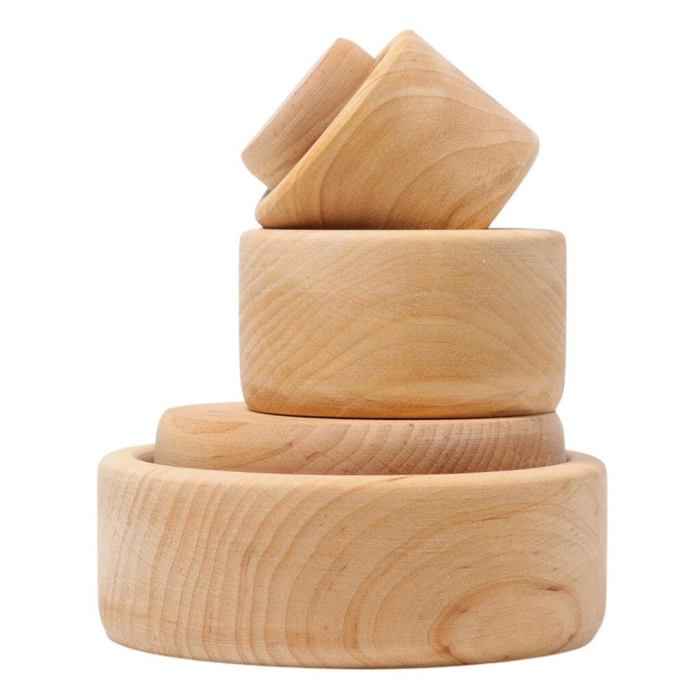 Grimms- Set of bowls natural stacked on a white background.