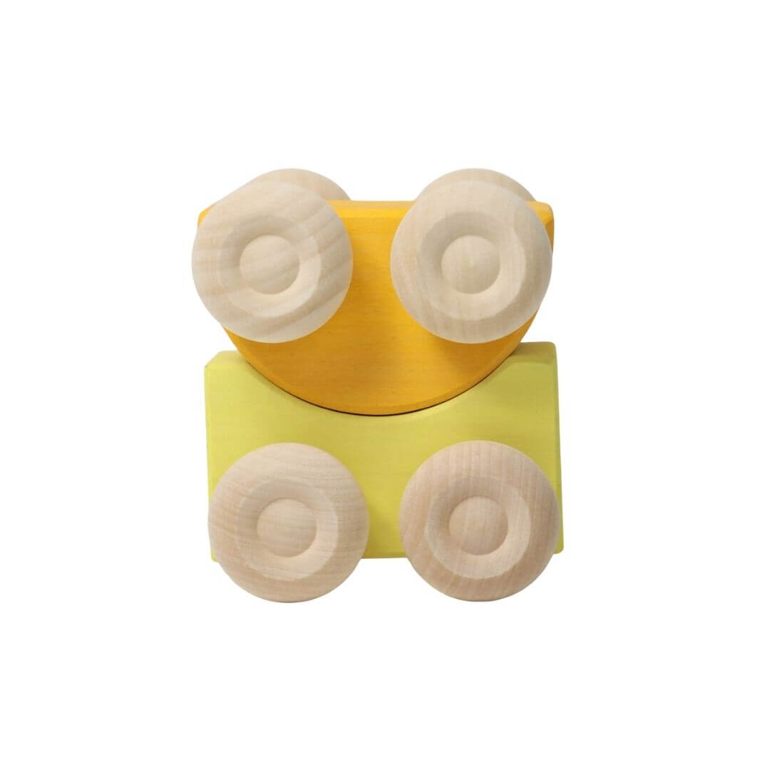 The soft yellow and bright yellow colorful wooden stacking cars by Grimm’s, handcrafted in assorted rainbow hues for open-ended play and building fun - Bella Luna Toys