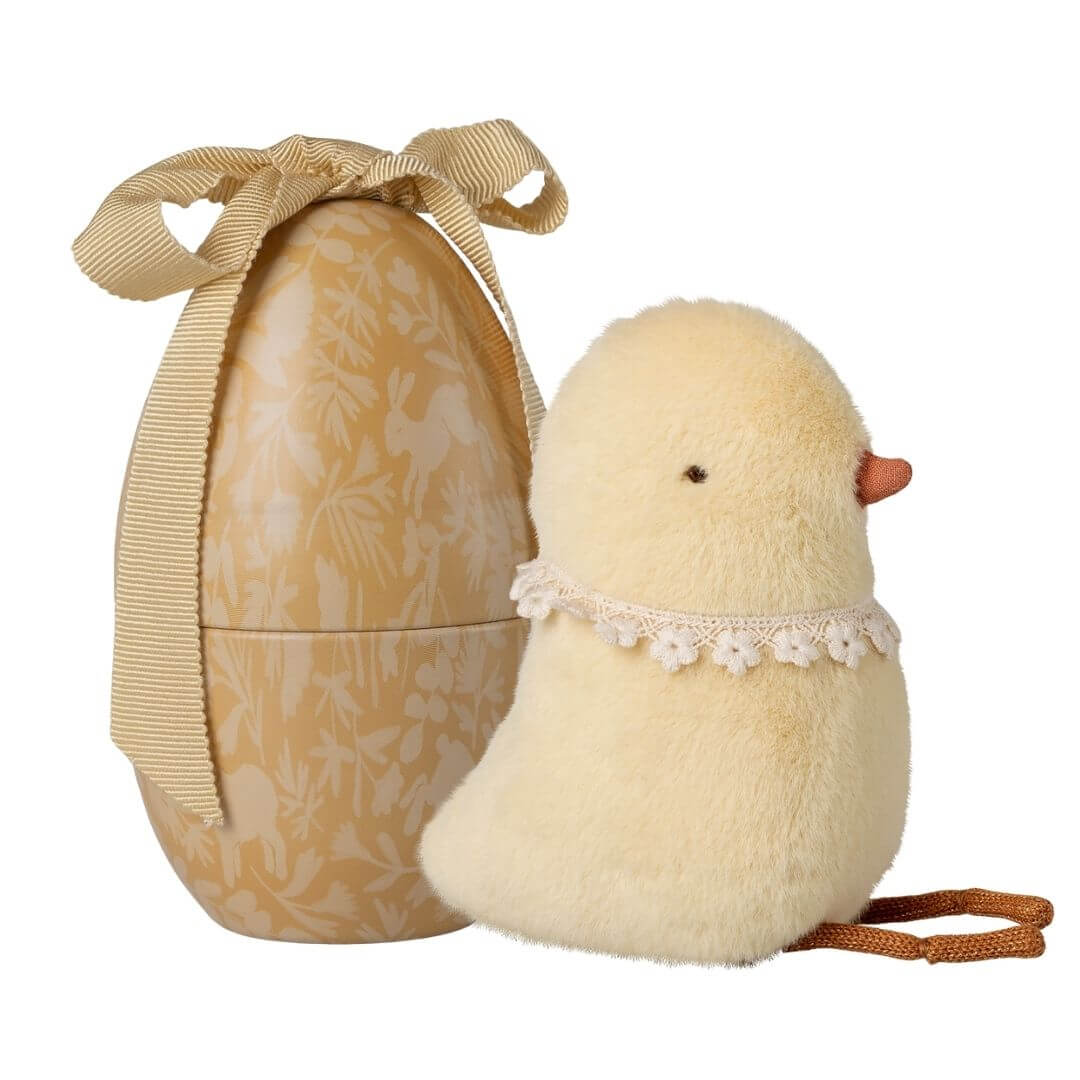 Maileg plush chick with vintage cotton collar inside illustrated metal Easter egg with fabric bow