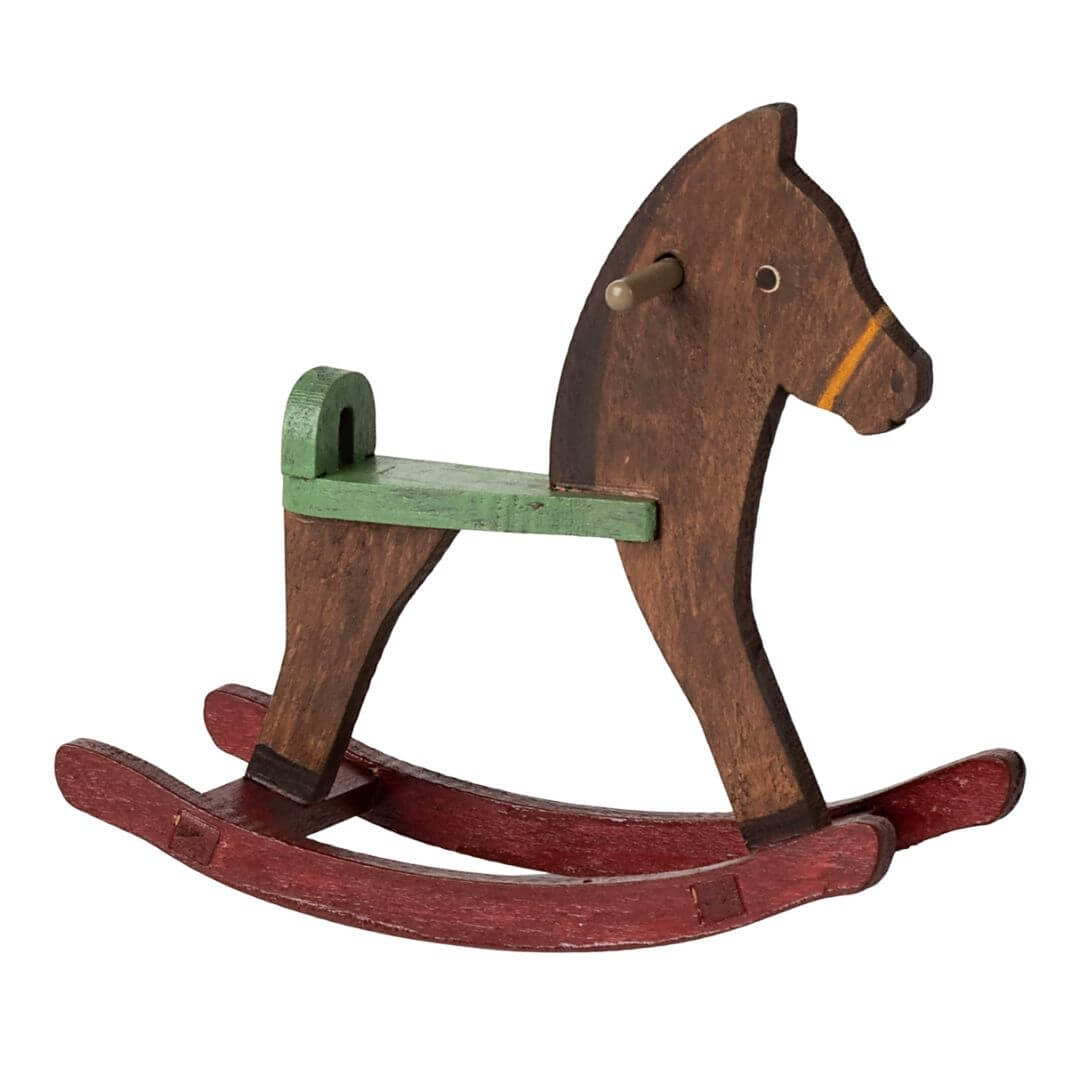 Wooden Maileg rocking horse in brown with red rockers and green seat, sized for Maileg mice.