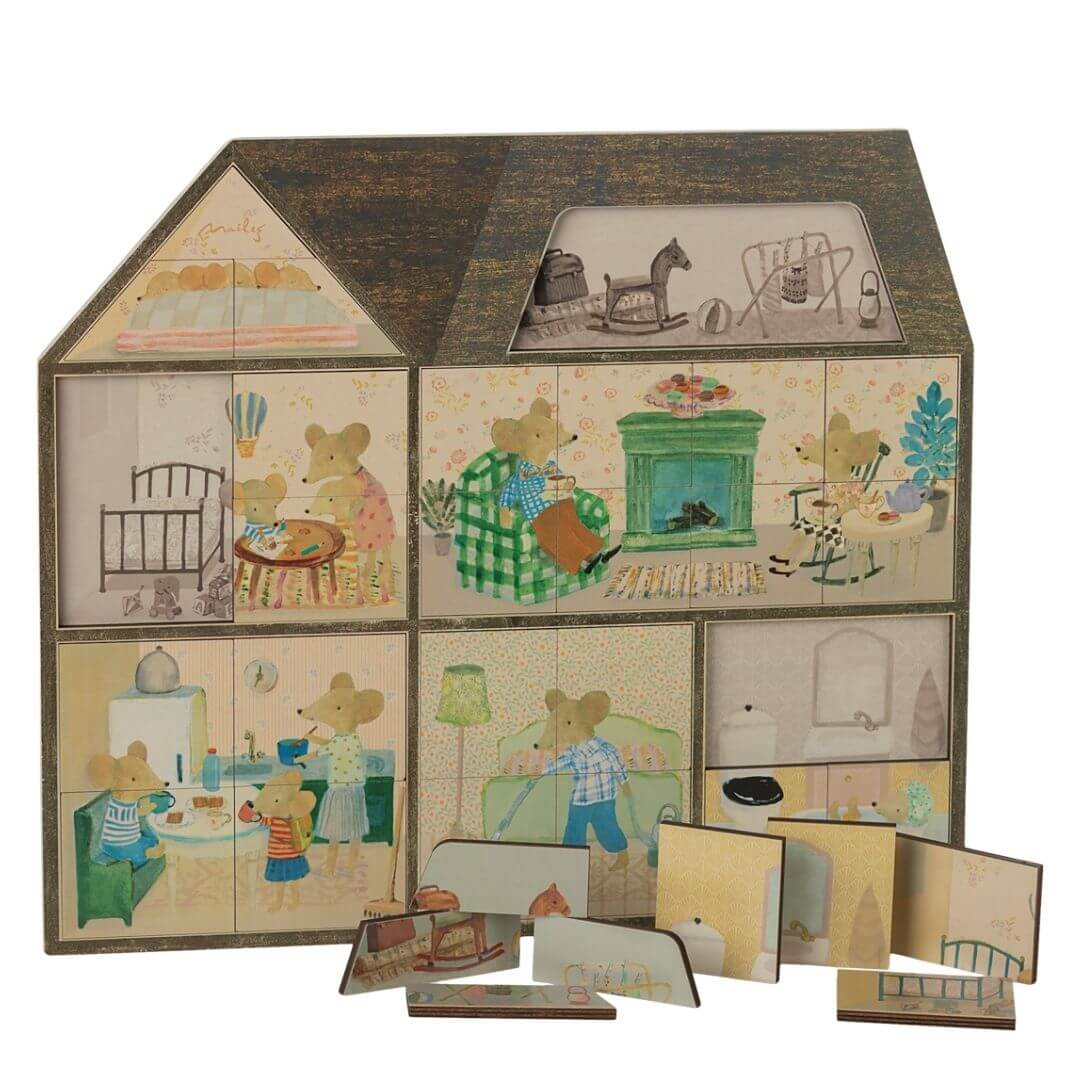 Maileg Mouse Hole Farmhouse Wooden Puzzle from Maileg featuring 7 illustrated rooms and 31 non-interlocking wooden pieces resting on a printed base board.