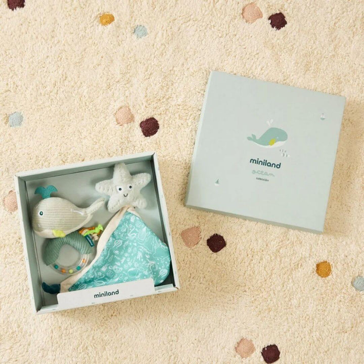 Miniland - Ocean-Themed Baby Gift Set on a cozy rug showing the gift box and contents - Bella Luna Toys