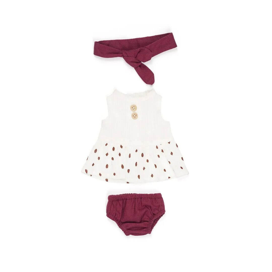 Miniland Summer Beach Doll Outfit for 12-inch dolls, includes a sleeveless white top with a red dotted pattern, matching burgundy diaper cover, and a burgundy headband, laid out on a white background.