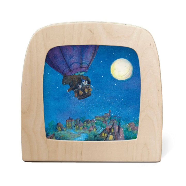 Toverlux StoryLux Magic Lamp Night Light Silhouette – Goodnight Sandman Balloon Scene featuring a whimsical purple hot air balloon drifting over a starlit village with a glowing moon above.