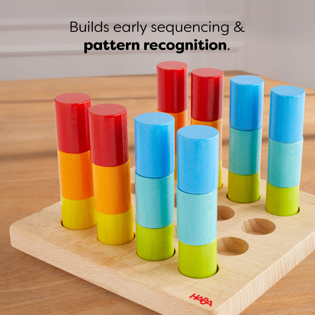 Wooden peg toy with colored stacking blocks, text reads "Builds early sequencing & pattern recognition."