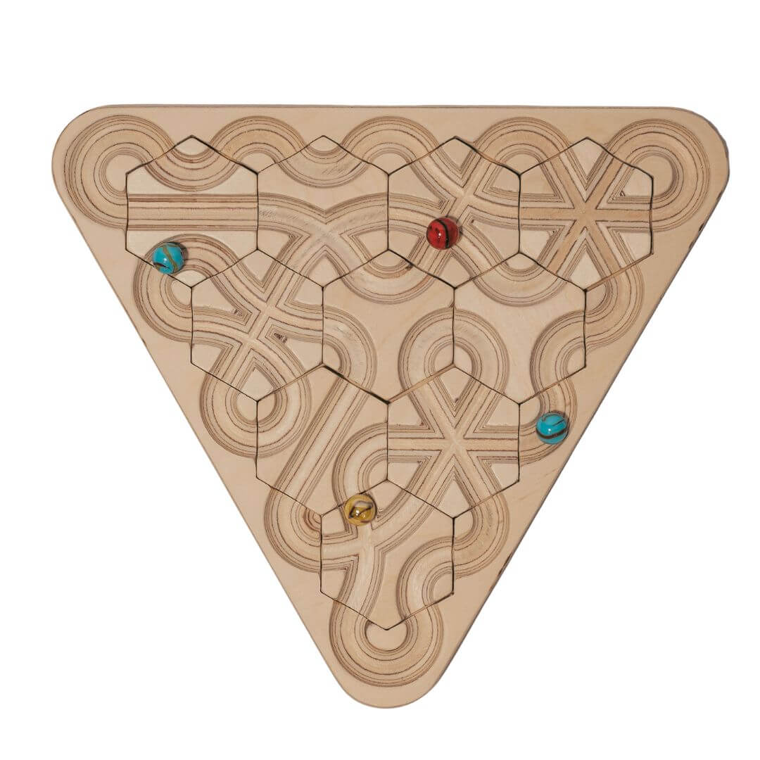 Wooden mindfulness marble maze with rearrangeable hexagon tiles arranged in a triangle board, featuring looping engraved pathways and colorful marbles for calming, open-ended play- Bella Luna Toys 