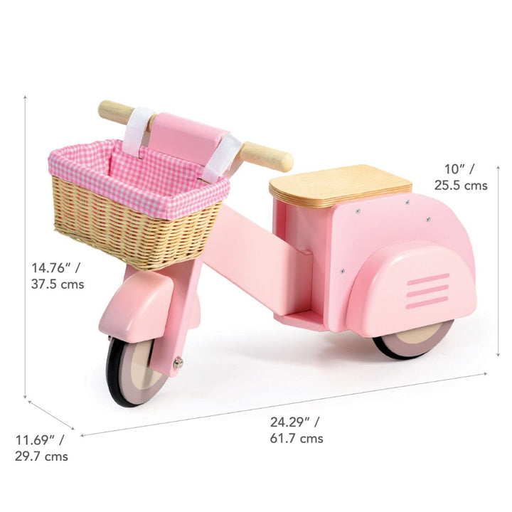Tender Leaf Toys pink wooden scooter with gingham-lined wicker basket and wooden seat, designed for toddlers with dimensions.
