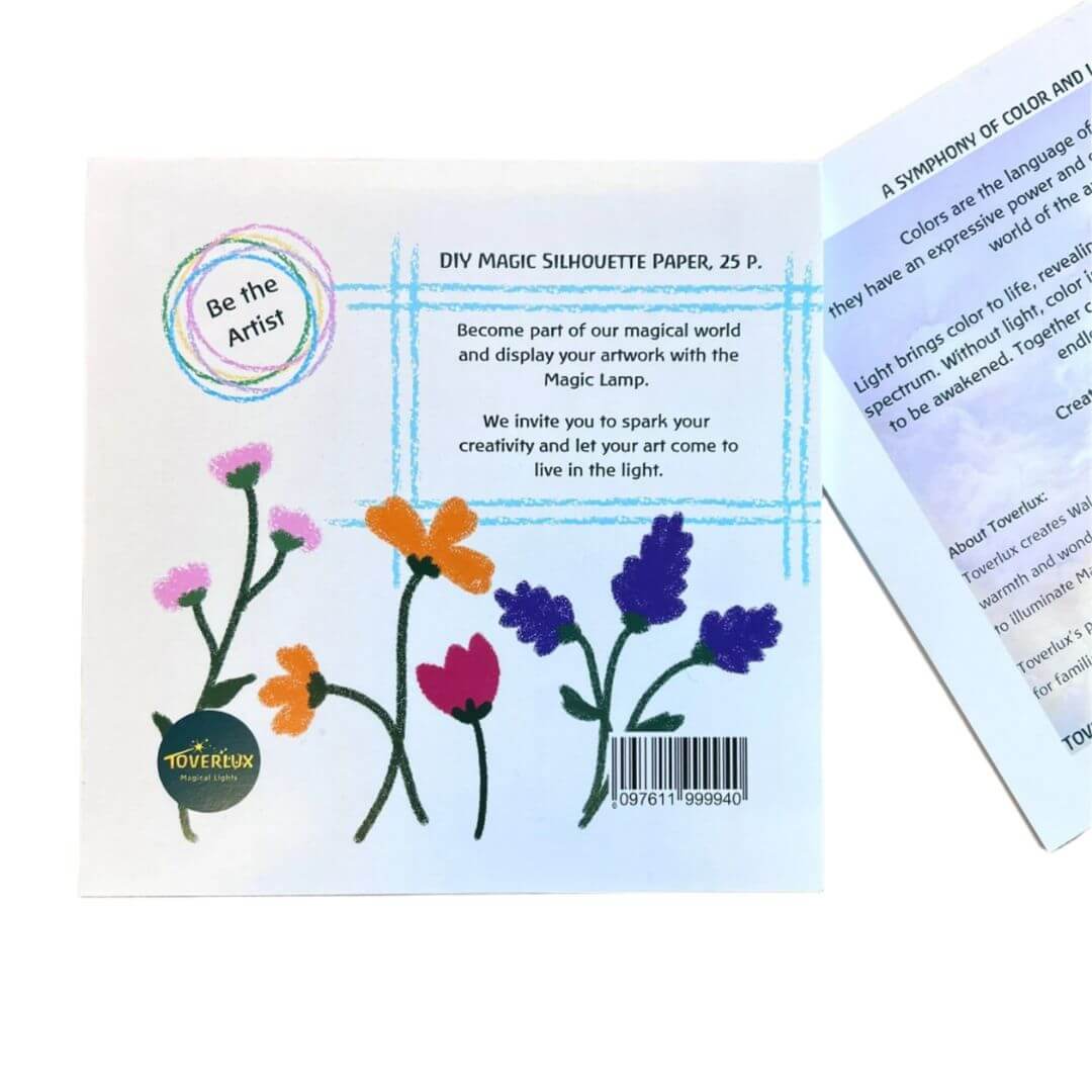 Cover of the Toverlux DIY Magic Silhouette Paper Pad featuring colorful hand-drawn flowers and the message “Be the Artist,” with 25 sheets for creating artwork to use in the Toverlux Lamp.