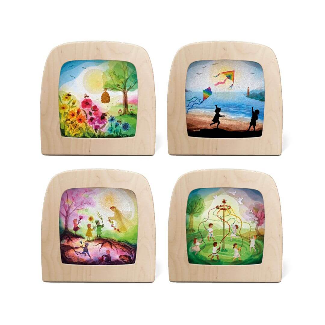Set of 4 seasonal transparencies for the Toverlux lamp featuring artwork from the Vogel Geluk Collection.