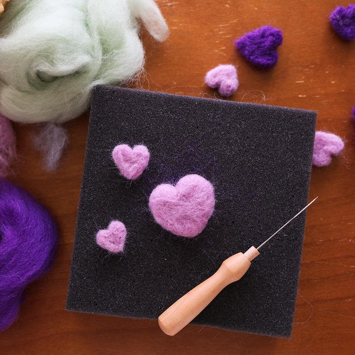 Wool roving in the shape of a heart.